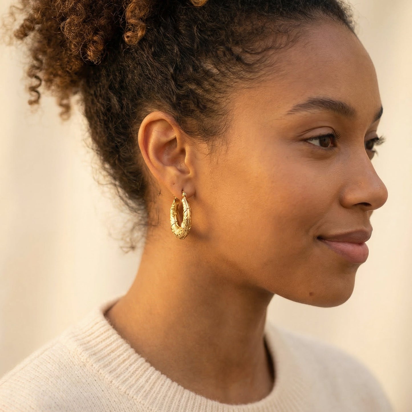 Woman wearing Elegant Vintage Hoop Earrings