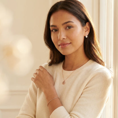 Woman wearing Elegant Rose Gold Jewelry Set