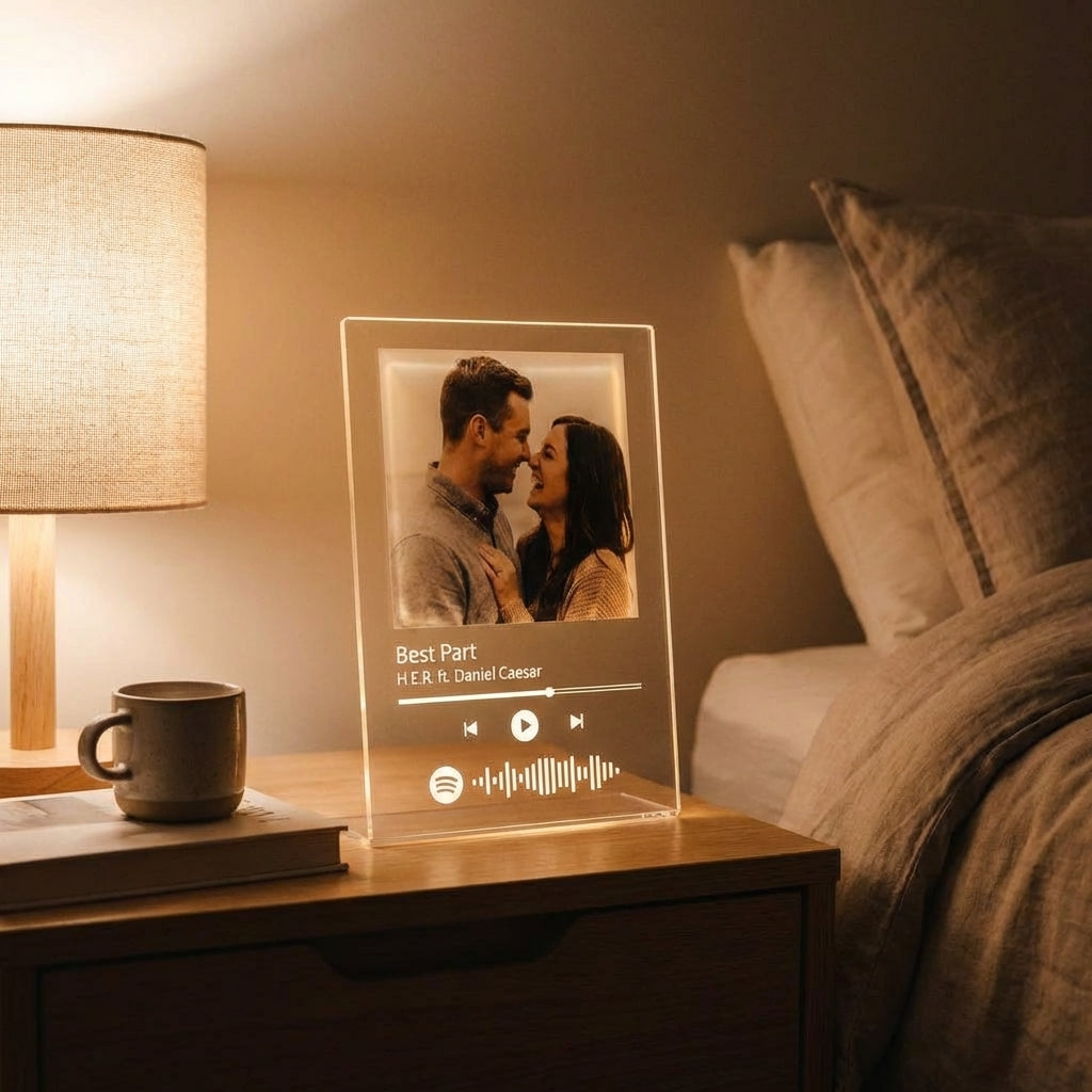Custom Spotify Plaque on nightstand with warm lamp lighting